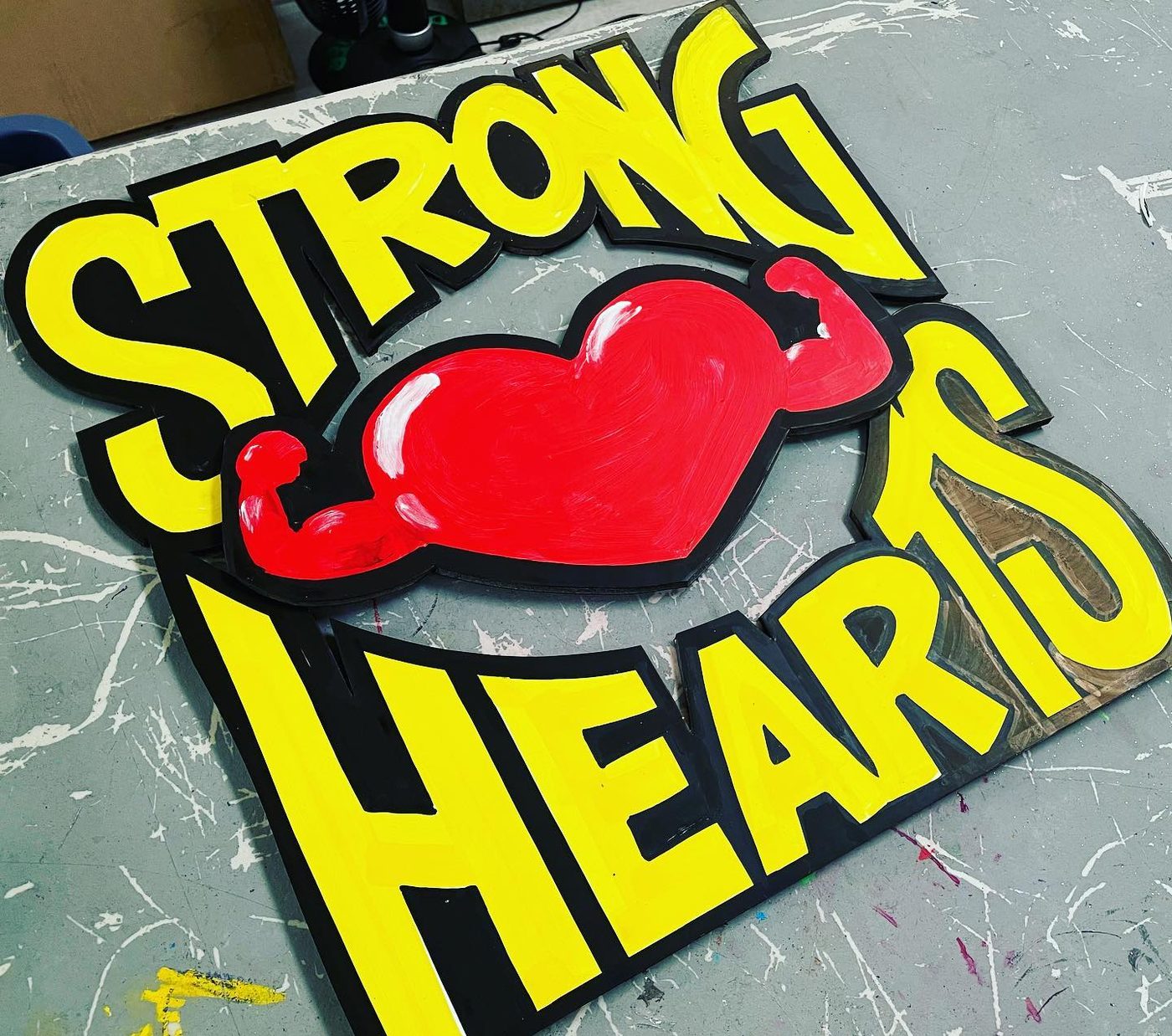 Hand-painted sign by Darien Bathalter