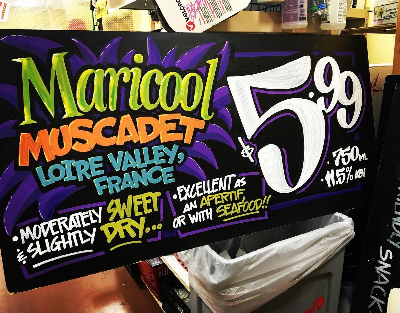 Hand-painted sign by Darien Bathalter