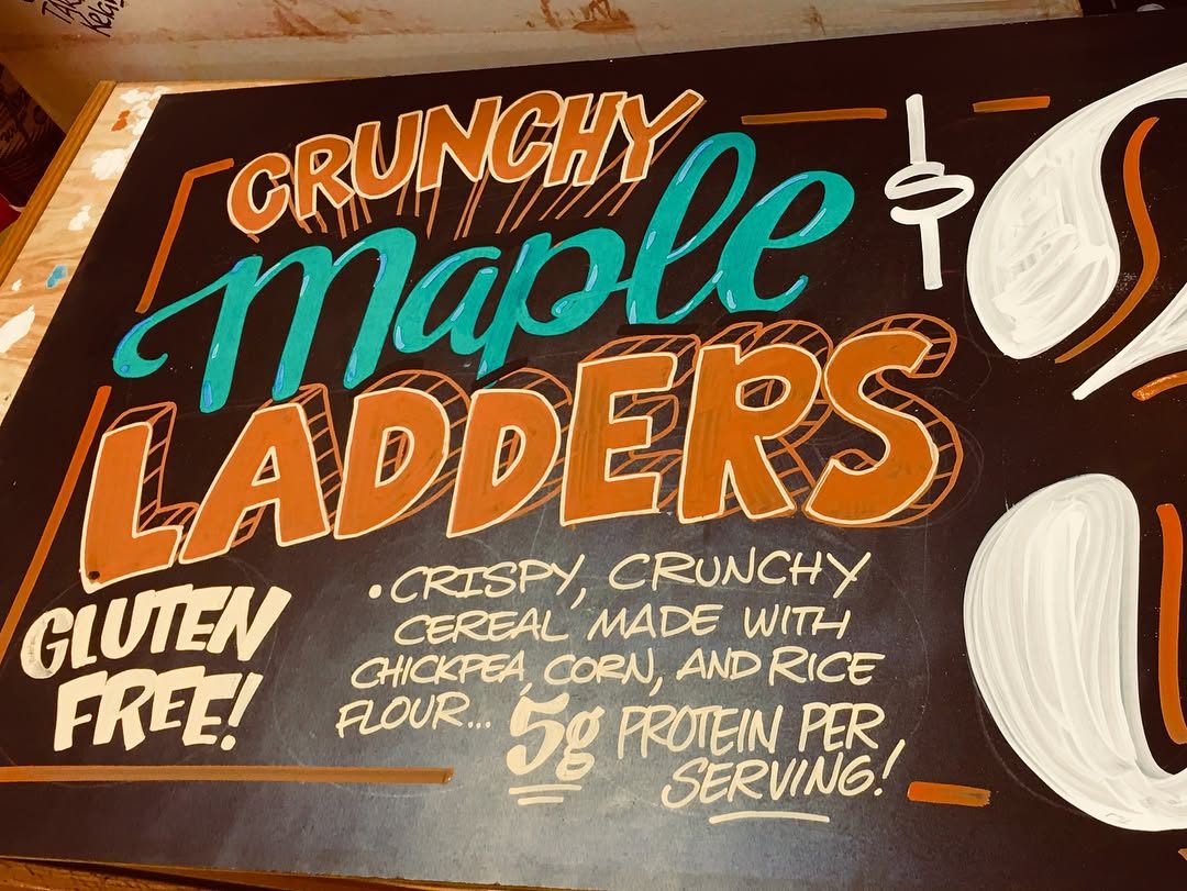 Hand-painted sign by Darien Bathalter