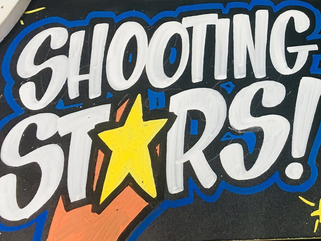 Hand-painted sign by Darien Bathalter