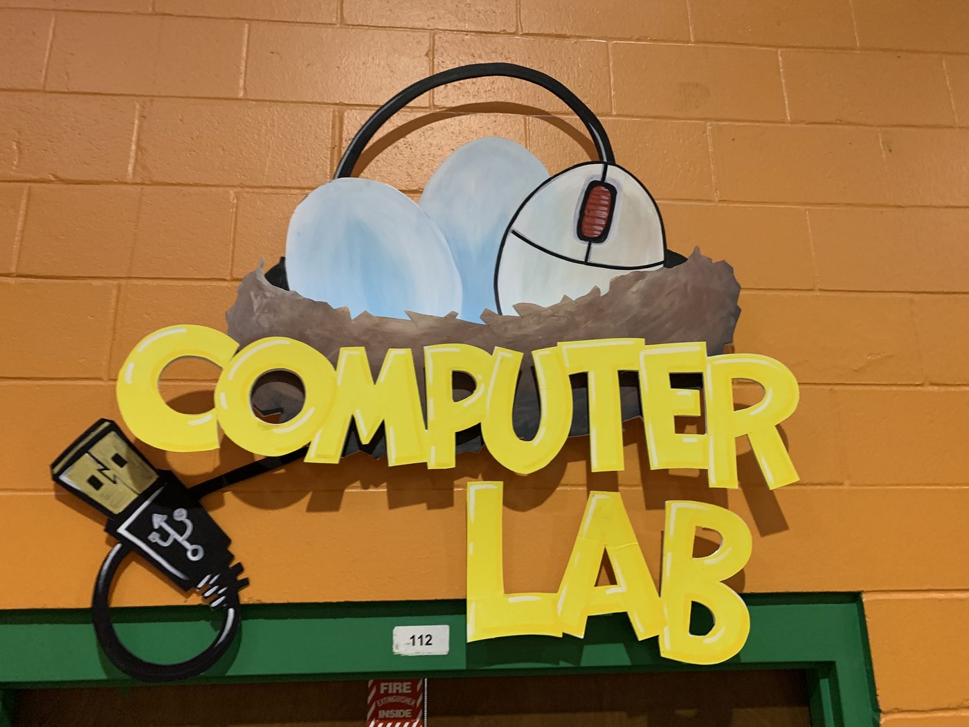 Hand-painted sign by Darien Bathalter